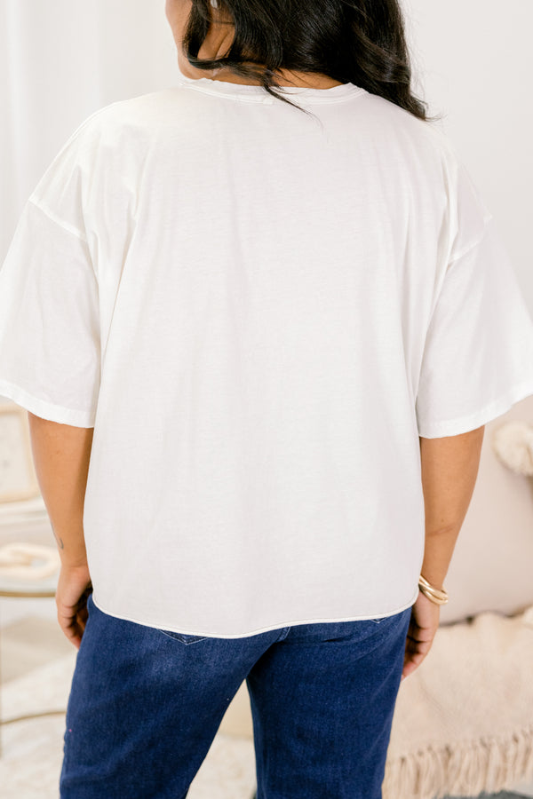 Chic Soul plus size clothing, white short sleeve slightly cropped vintage wash tee with “Here For The Good Vibes” text in pink on the front and a pink mirrorball in the middle