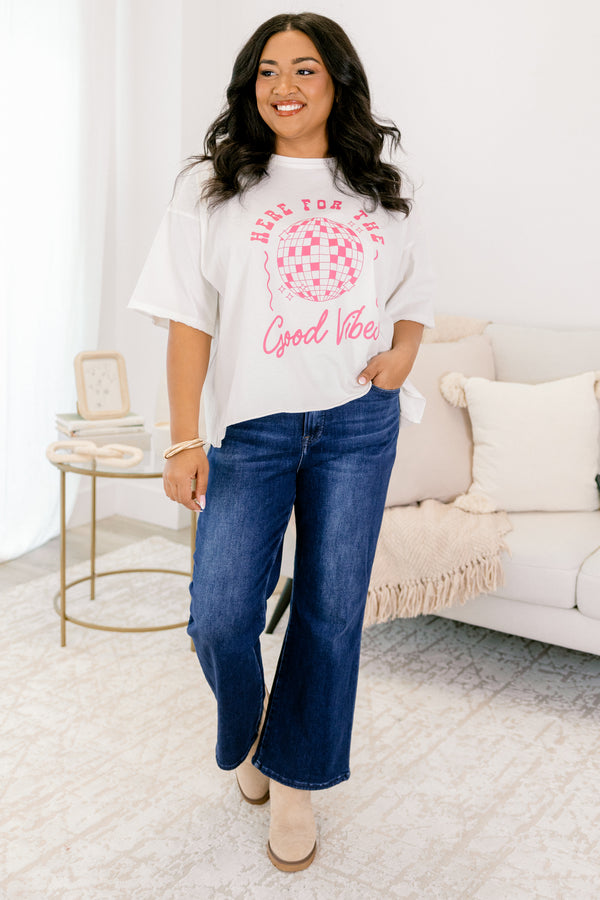 Chic Soul plus size clothing, white short sleeve slightly cropped vintage wash tee with “Here For The Good Vibes” text in pink on the front and a pink mirrorball in the middle