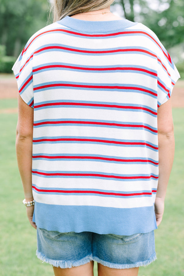 Plus size cream short sleeve sweater top with red and blue stripes and a flowy fit.