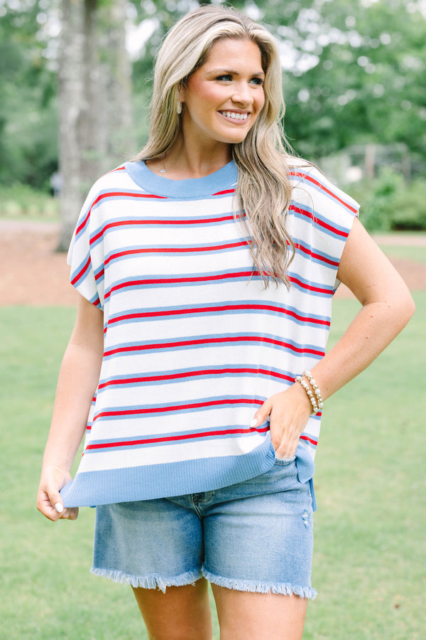 Plus size cream short sleeve sweater top with red and blue stripes and a flowy fit.