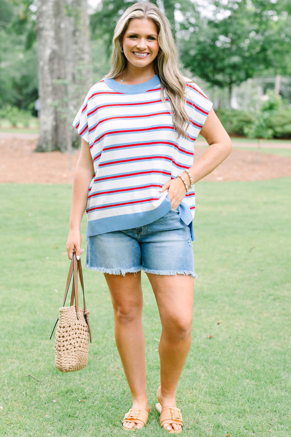 Plus size cream short sleeve sweater top with red and blue stripes and a flowy fit.