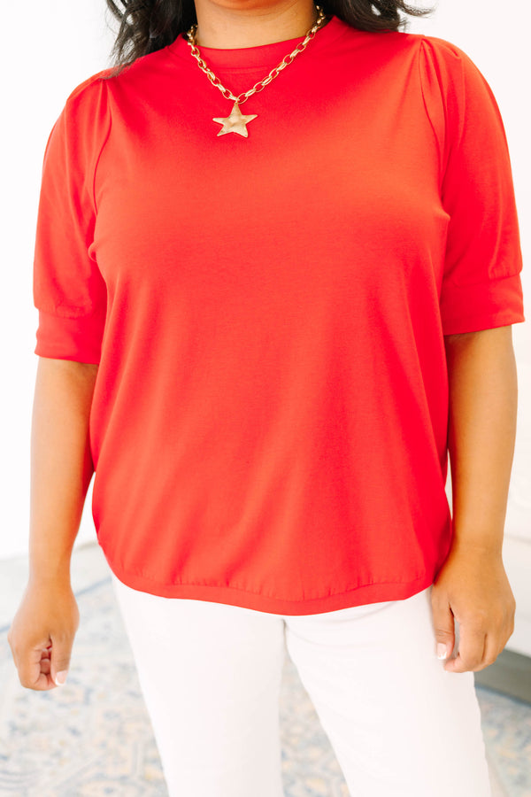 Plus size red short sleeve top with a relaxed fit