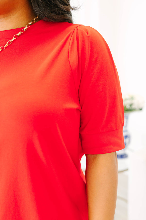 Plus size red short sleeve top with a relaxed fit