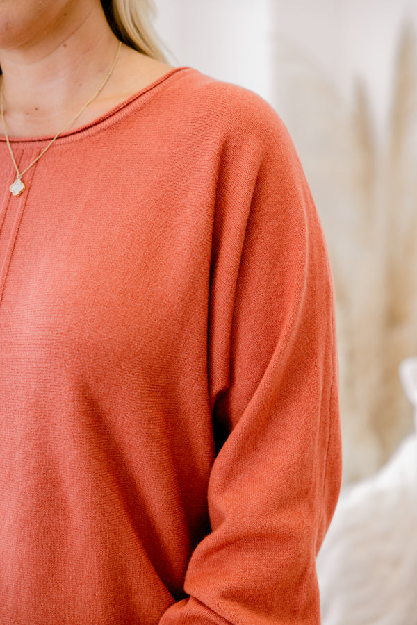 Chic Soul plus size clothing, rust orange long sleeve sweater with ribbed sinched sleeves and hem and 2 vertical center front seam details