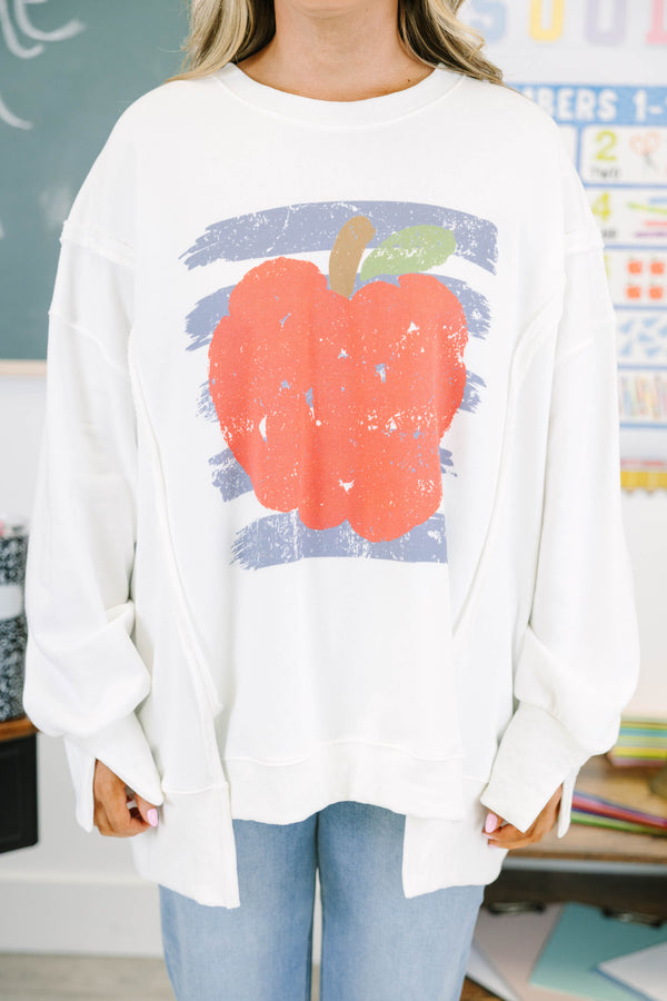 Plus size ivory sweatshirt with a distressed apple graphic.