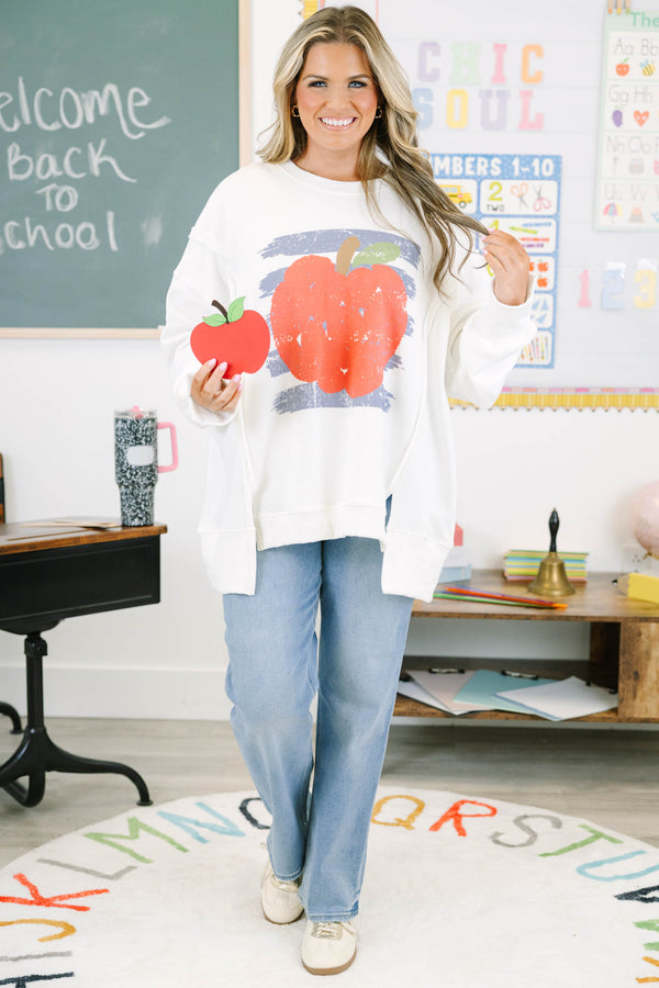 Plus size ivory sweatshirt with a distressed apple graphic.