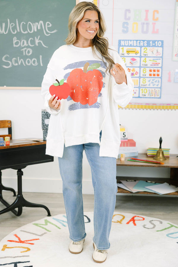 Plus size ivory sweatshirt with a distressed apple graphic.
