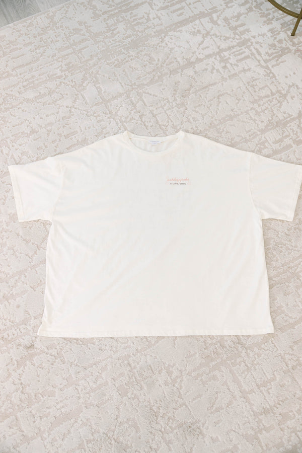 Plus size clothing, ivory oversized boyfriend tee with Houston, Texas graphic and cowboy boots
