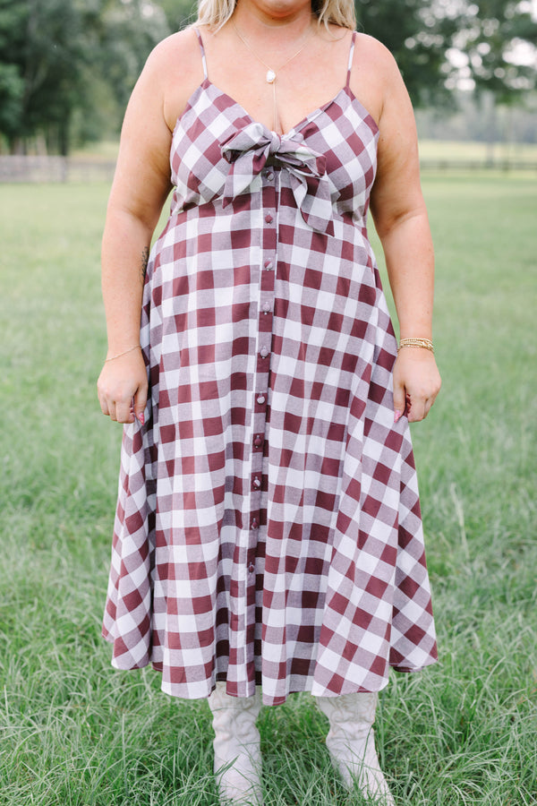 Plus Size brown and white gingham midi dress with a tie-front bodice and button-down front.