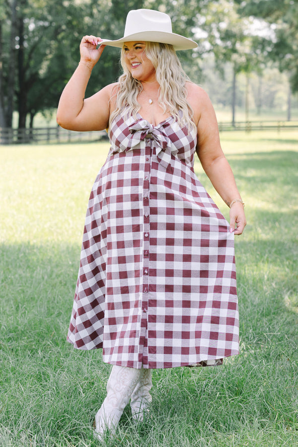 Plus Size brown and white gingham midi dress with a tie-front bodice and button-down front.