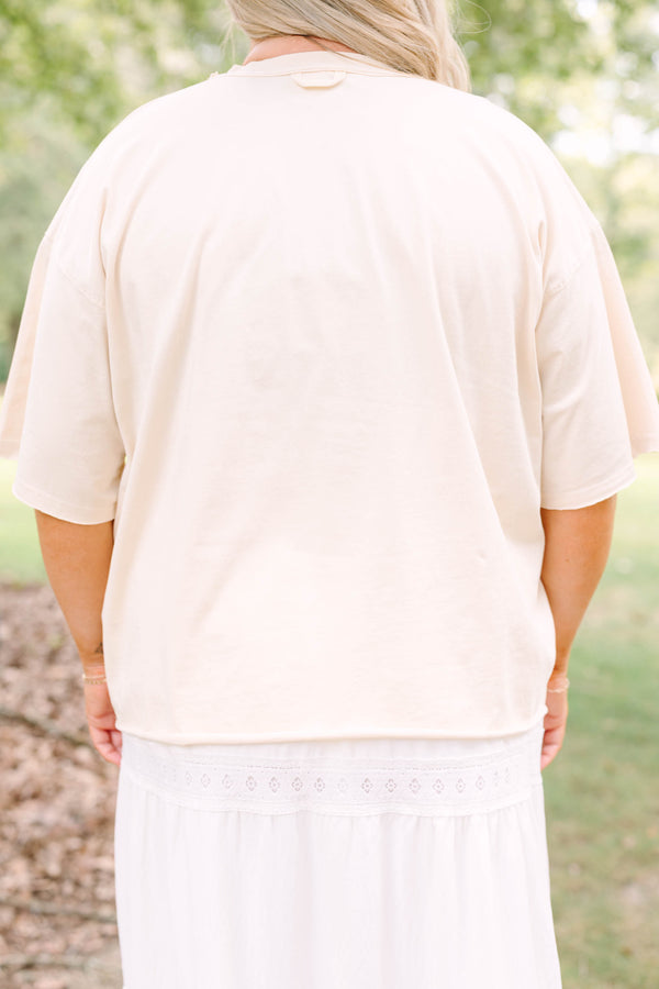 Plus Size sand vintage wash tee with a leopard print 'HOWDY' graphic and white lace-trim skirt.