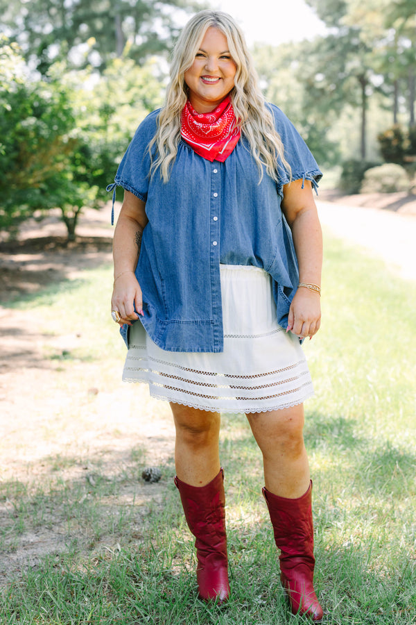 Plus Size denim tunic with short tie-sleeves, button-down front, and a relaxed fit.