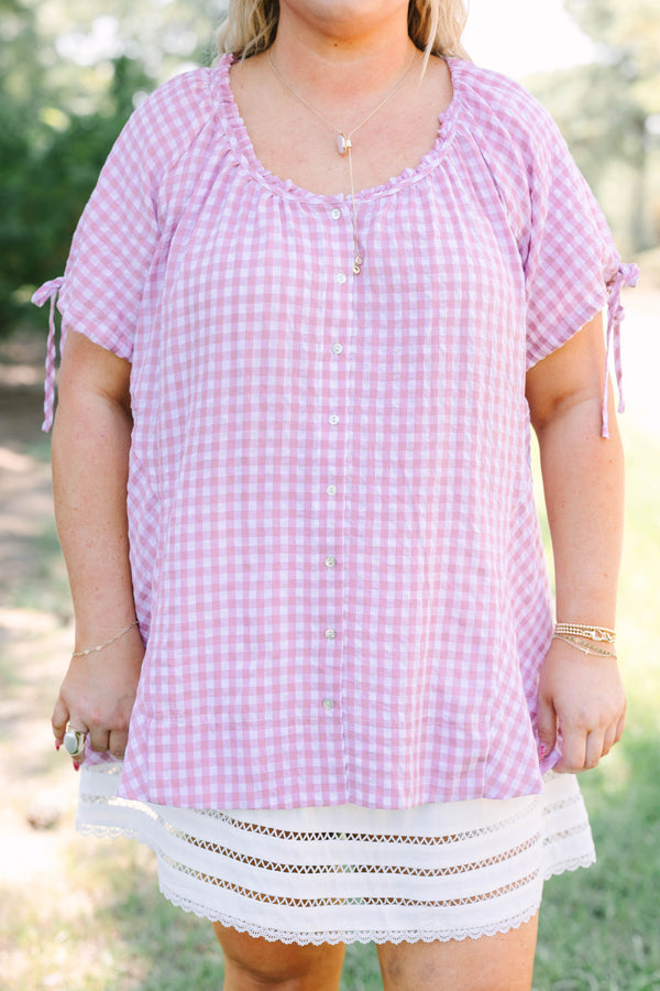 Plus Size pink and white gingham tunic with short tie-sleeves and a button-down front.