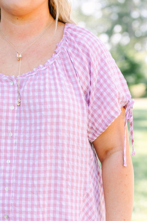 Plus Size pink and white gingham tunic with short tie-sleeves and a button-down front.