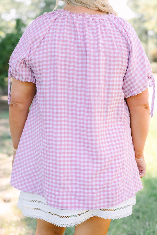 Plus Size pink and white gingham tunic with short tie-sleeves and a button-down front.