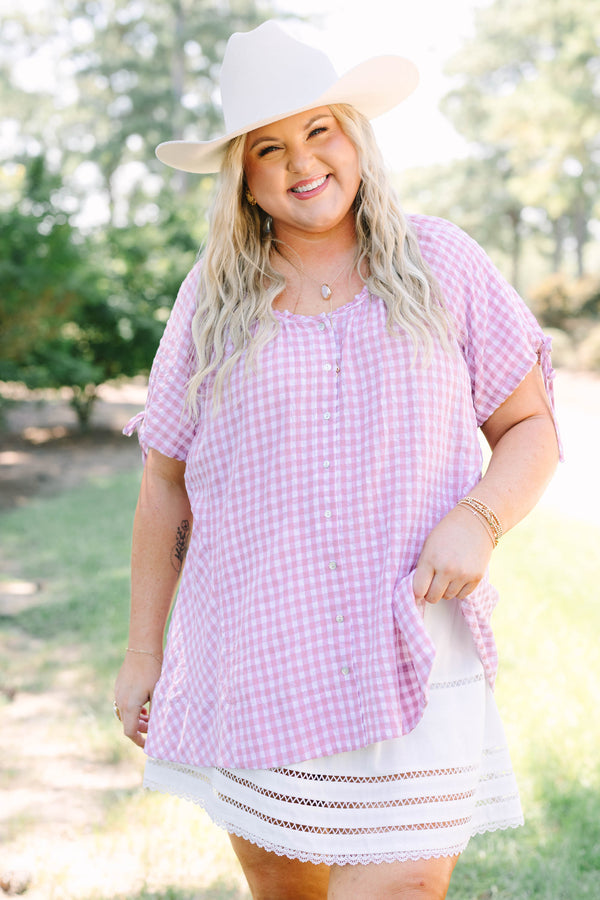 Plus Size pink and white gingham tunic with short tie-sleeves and a button-down front.