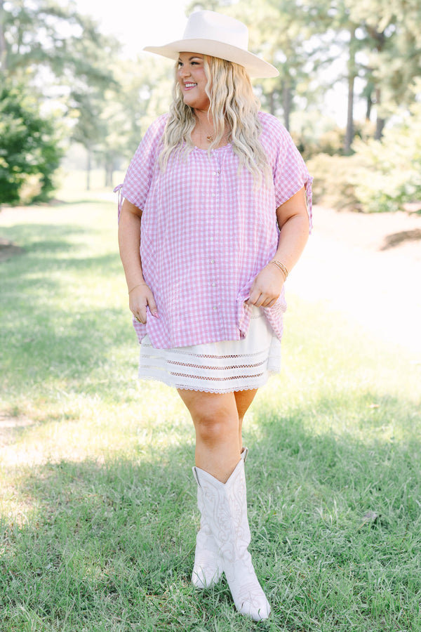 Plus Size pink and white gingham tunic with short tie-sleeves and a button-down front.
