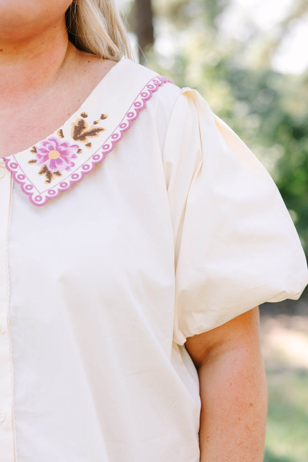 Plus Size cream cotton button-up top with puff sleeves and a pink floral embroidered collar.