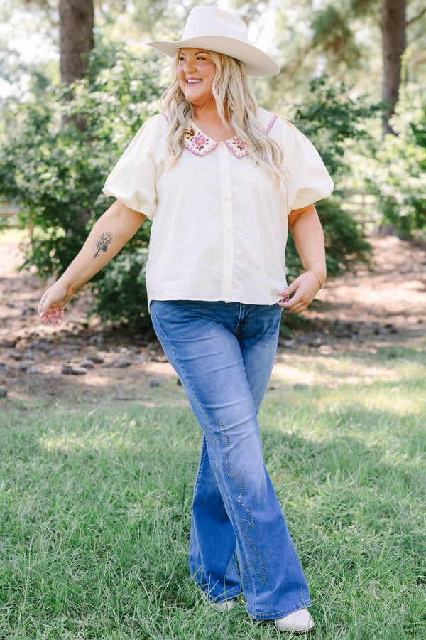 Plus Size cream cotton button-up top with puff sleeves and a pink floral embroidered collar.