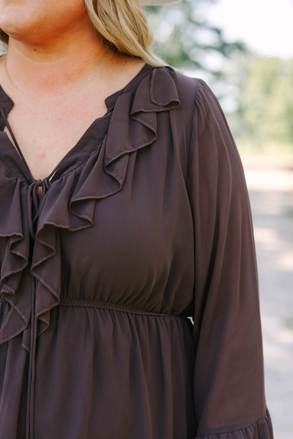 Plus Size brown long sleeve dress with a ruffled V-neckline, tiered skirt, and bell sleeves.