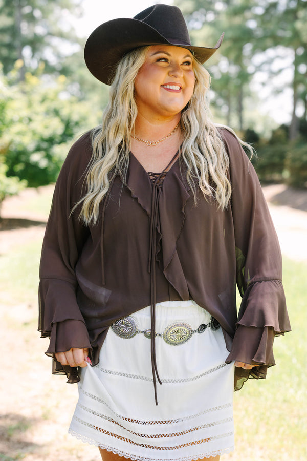 Plus Size brown long sleeve top with ruffle trim, lace-up neckline, and tiered bell sleeves.