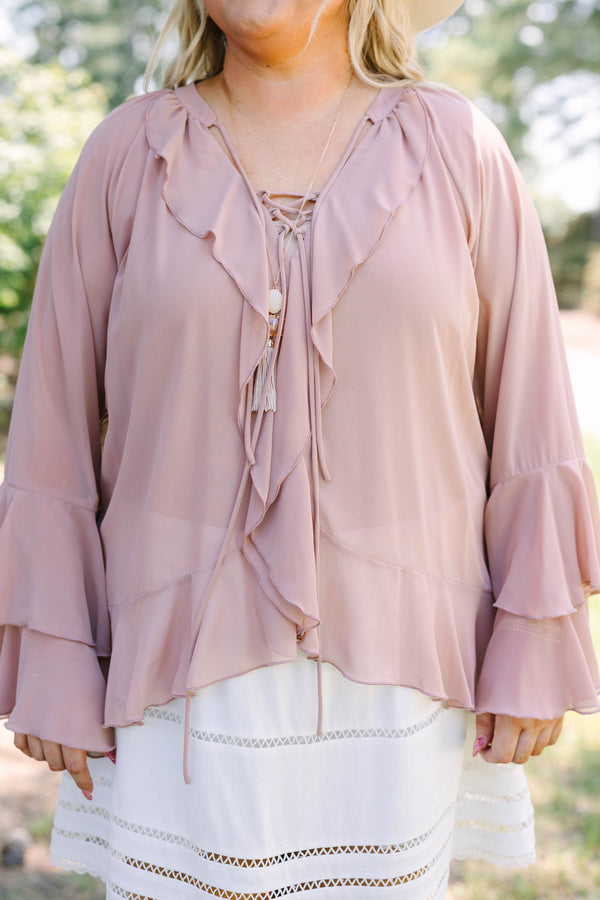 Plus Size dusty pink long sleeve top with ruffle details, a lace-up neckline, and tiered sleeves.