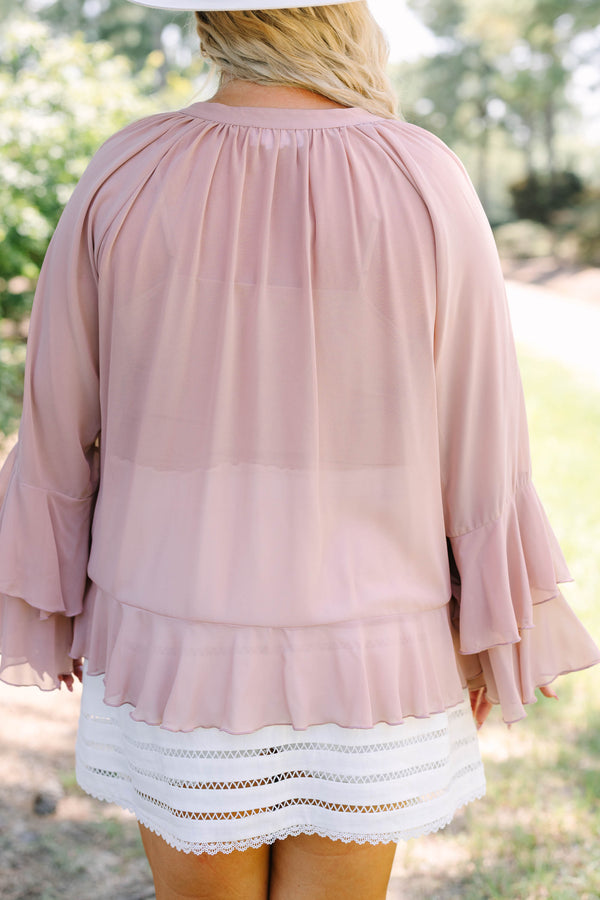 Plus Size dusty pink long sleeve top with ruffle details, a lace-up neckline, and tiered sleeves.