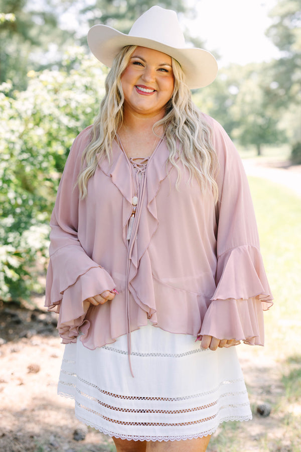 Plus Size dusty pink long sleeve top with ruffle details, a lace-up neckline, and tiered sleeves.