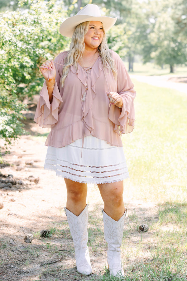 Plus Size dusty pink long sleeve top with ruffle details, a lace-up neckline, and tiered sleeves.