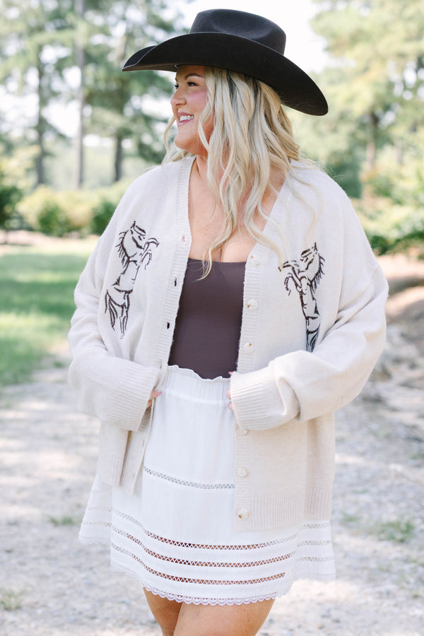 Plus Size tan knit cardigan with horse embroidery, button front, and long sleeves.