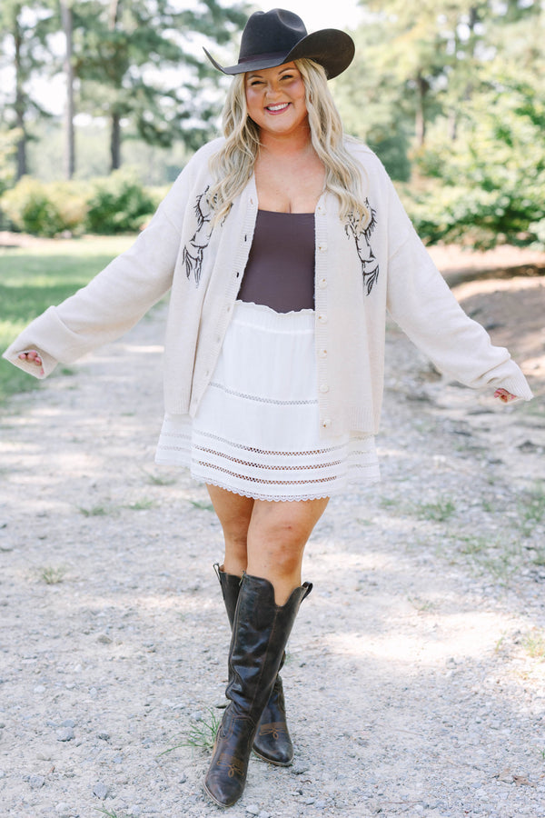 Plus Size tan knit cardigan with horse embroidery, button front, and long sleeves.