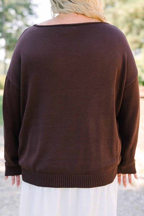 Plus Size brown knit sweater with a large white star on the front and long sleeves.