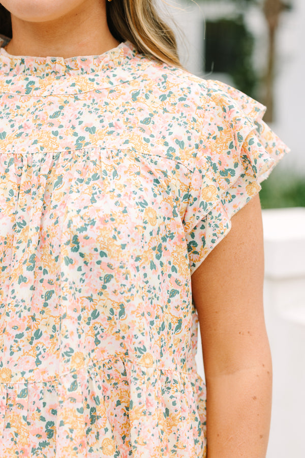 Chic Soul plus size clothing, yellow high neck top with a multi color floral pattern and flutter sleeves 
