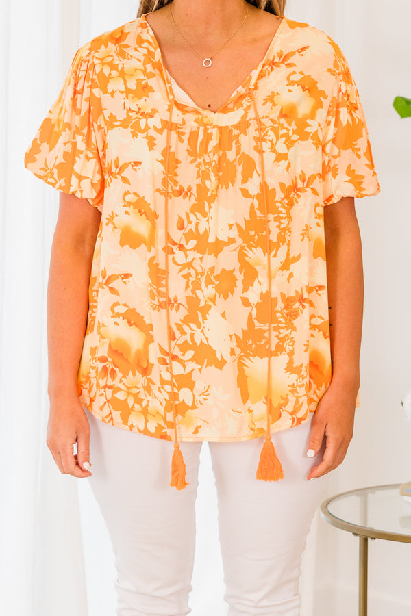 Chic Soul plus size clothing, short sleeve orange top with darker orange floral pattern and orange tassels