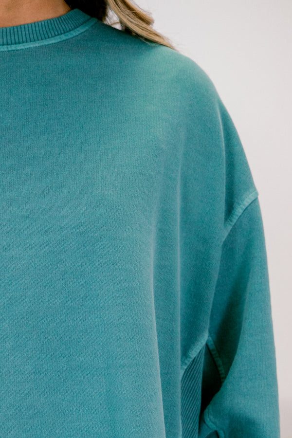 Chic Soul plus size clothing, teal long sleeve pullover with side slits