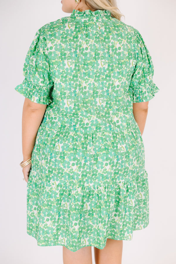 Chic Soul plus size clothing, puffed short sleeve green ruffled baby doll dress with smocked v-neckline and floral green and yellow pattern 