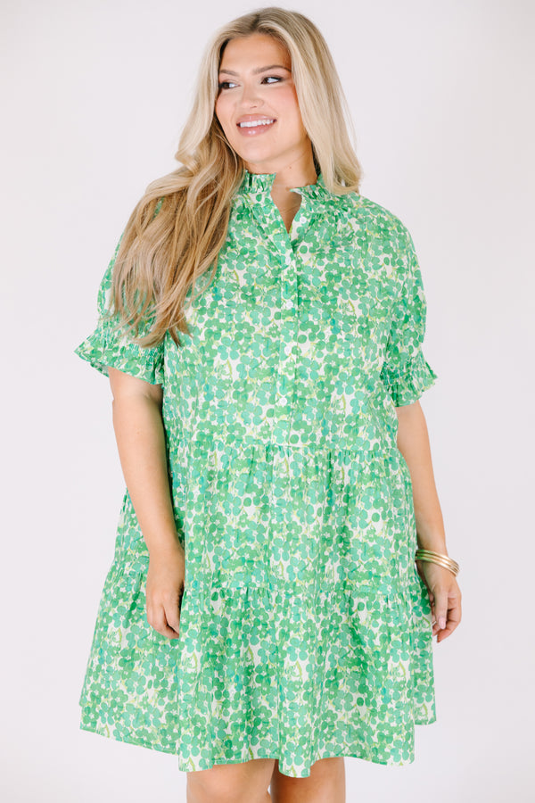 Chic Soul plus size clothing, puffed short sleeve green ruffled baby doll dress with smocked v-neckline and floral green and yellow pattern 