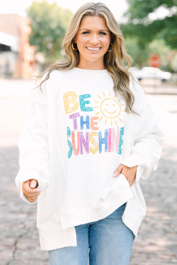 Plus size ivory crew neck pullover with colorful 'be the sunshine' graphic