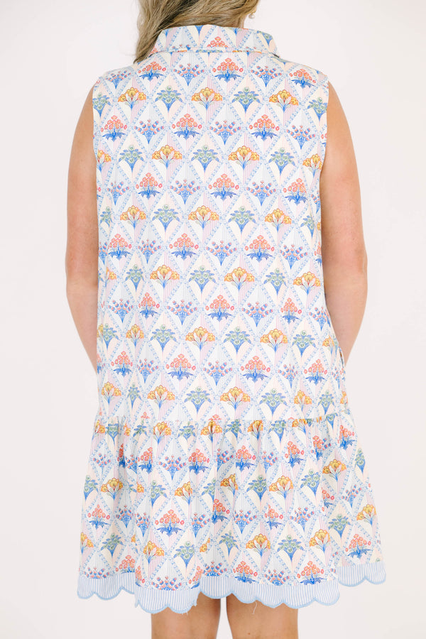 Plus Size cream sleeveless mini dress with a floral diamond print, scalloped trim, and button front.