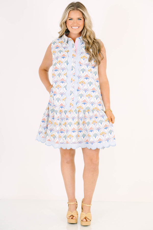 Plus Size cream sleeveless mini dress with a floral diamond print, scalloped trim, and button front.