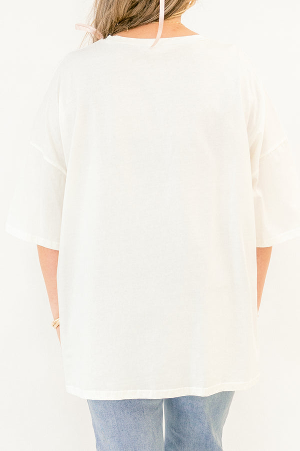 Chic Soul plus size clothing, whtie short sleeve boyfriend tee with light brown teddy bear on the front with pink bow on its head and light pink heart with 