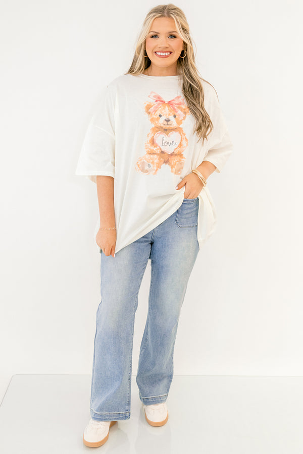 Chic Soul plus size clothing, whtie short sleeve boyfriend tee with light brown teddy bear on the front with pink bow on its head and light pink heart with 