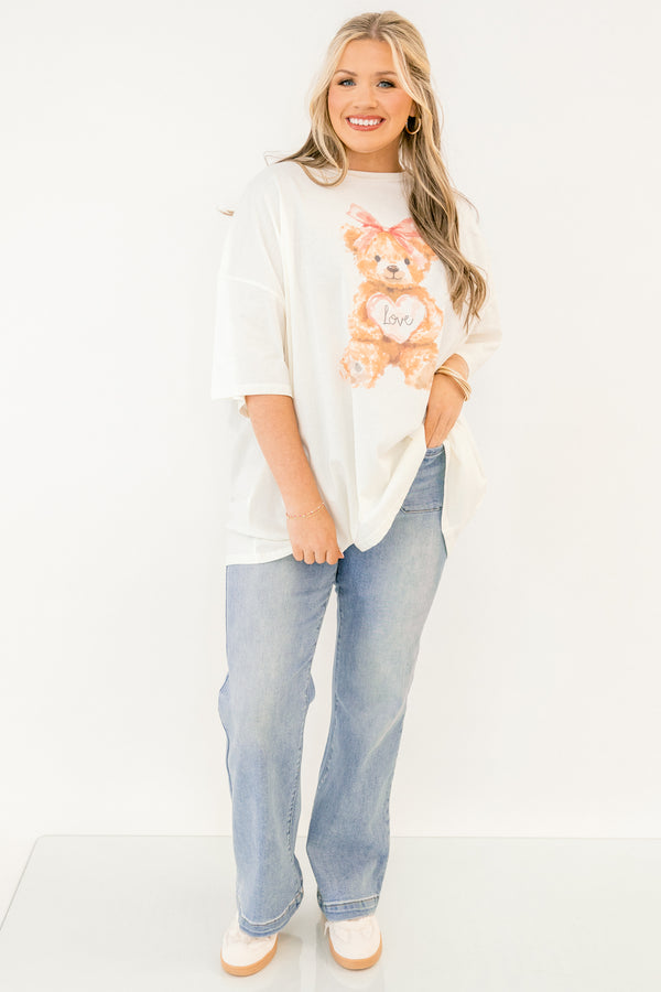 Chic Soul plus size clothing, whtie short sleeve boyfriend tee with light brown teddy bear on the front with pink bow on its head and light pink heart with 