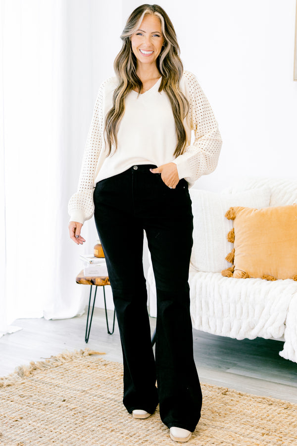 Chic Soul plus size clothing, black flare jeans front pockets and silver button detail on the waistband 