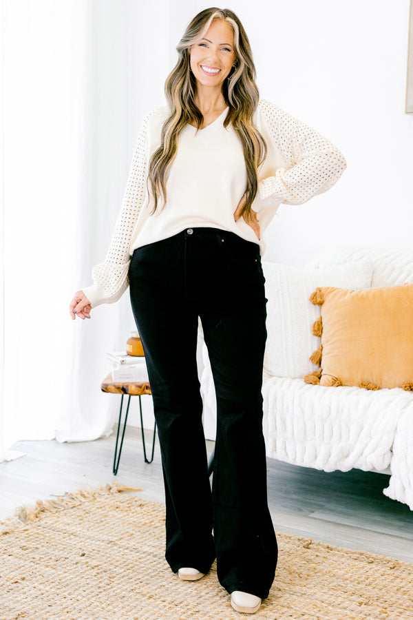 Chic Soul plus size clothing, black flare jeans front pockets and silver button detail on the waistband 