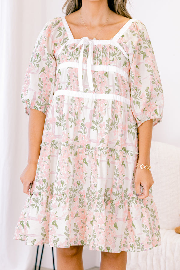 Chic Soul plus size clothing, white short bubble sleeve babydoll dress with light pink and sage green floral pattern and white ribbon bow on neckline