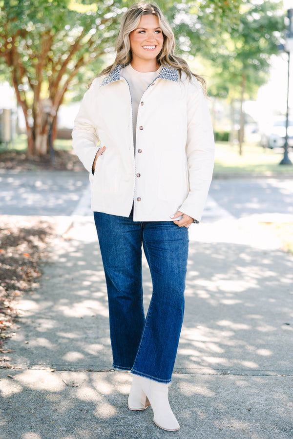 Plus size navy gingham reversible quilted coat with a taupe lining and button front.