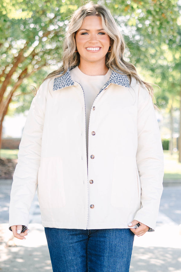 Plus size navy gingham reversible quilted coat with a taupe lining and button front.