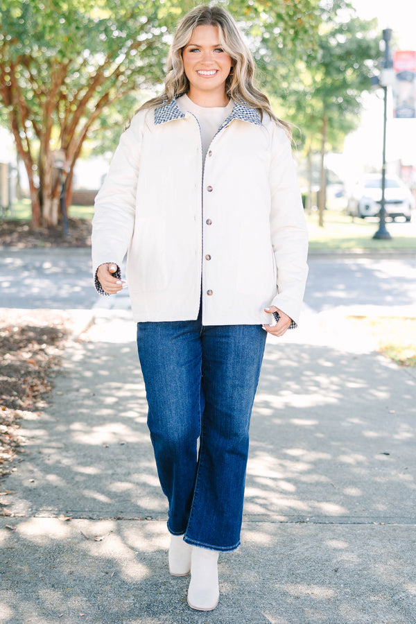 Plus size navy gingham reversible quilted coat with a taupe lining and button front.