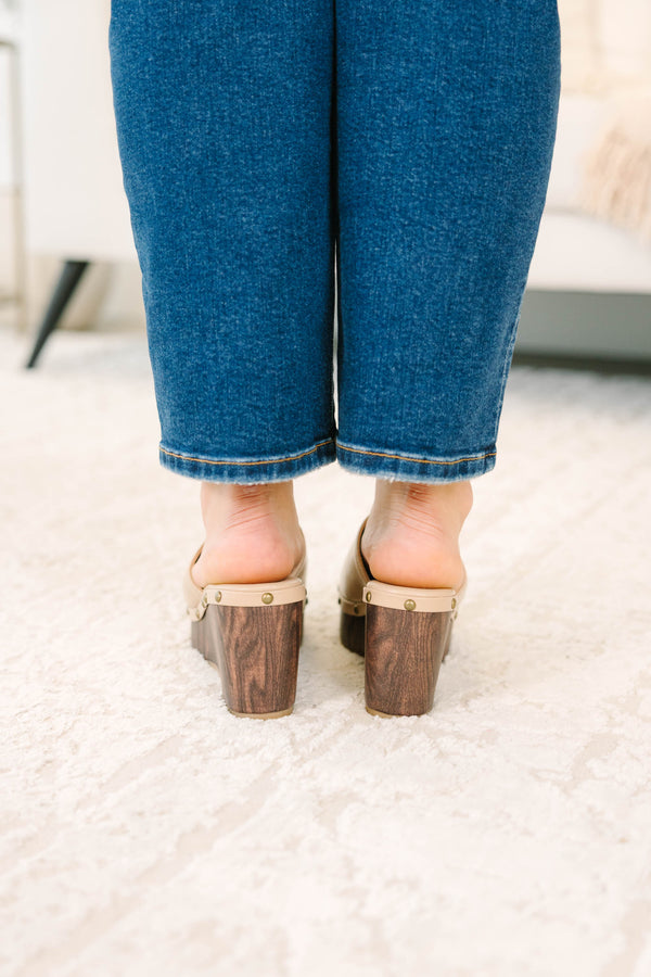 Plus Size brown faux leather wedge sandals with a wood-grain platform and stud details.